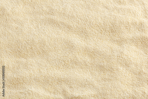 Uncooked semolina flour background Fototapet