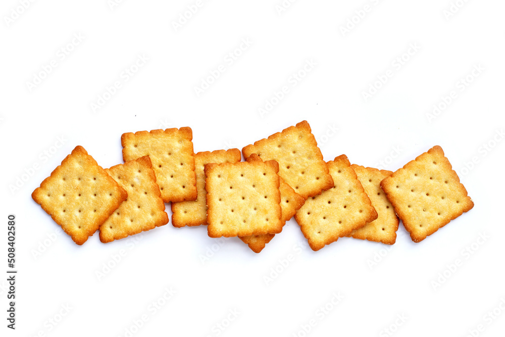 Dry cracker cookies on white background.