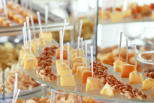 Reception table with the cheese plate and the grapes