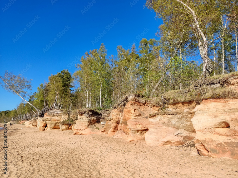 Veczemju Klintis, Veczemju Cliffs on Baltic Sea Near Tuja, Latvia. Beautiful Sea Shore With Limestone and Sand Caves. Calm, Relaxing, Meditation Nature. Concept of Romantic Evening and Holidays
