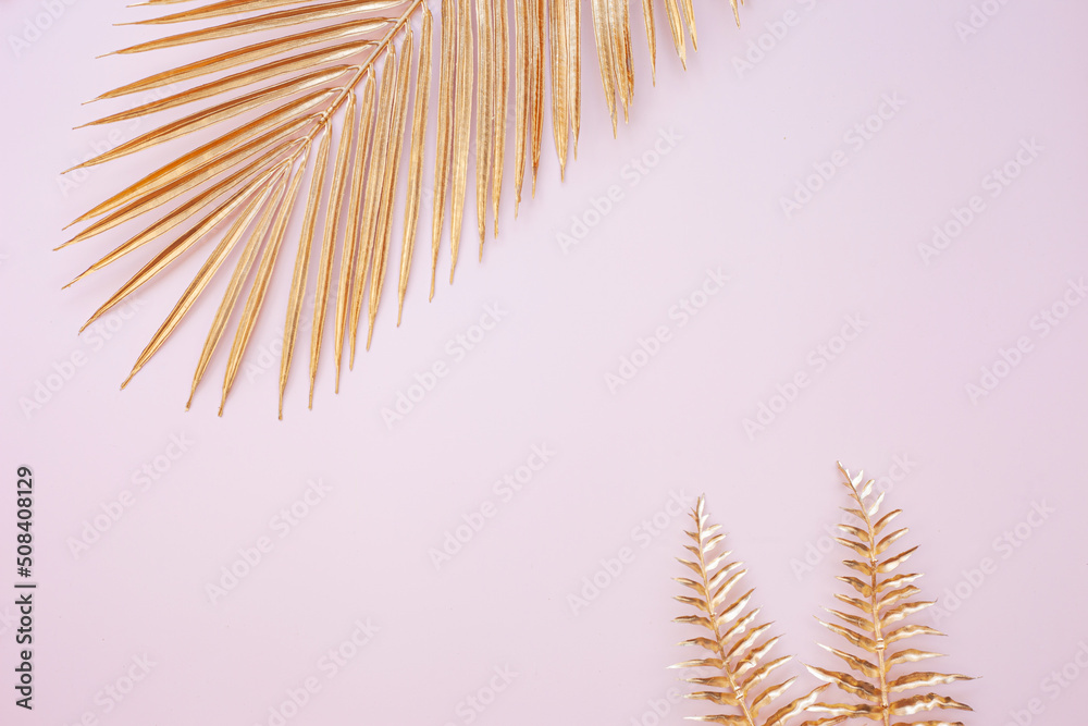 Creative nature layout made of tropical leaves. Summer concept. Monstera leaf on pink background. Creative nature layout made of tropical leaves. Summer concept. Monstera leaf on pink background.