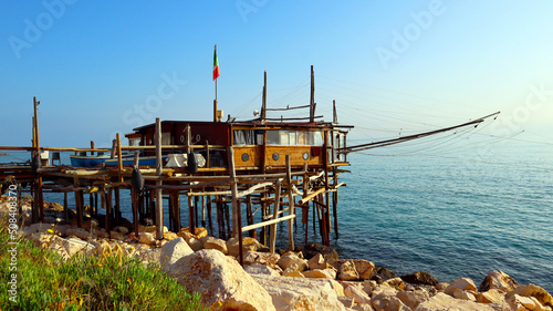 Coast of the Trabocchi, Trabocco in Marina di San Vito Chietino. The Trabocco is a traditional wooden fishing house on pilework typical of Adriatic sea, coast of Abruzzo, Italy photo