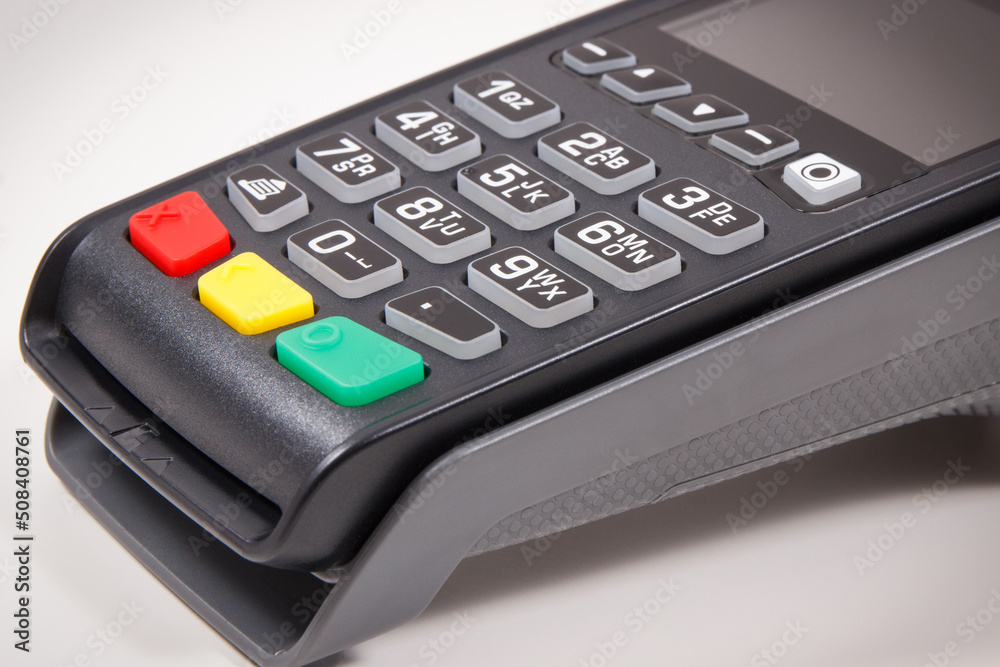 Payment terminal, credit card reader using for cashless paying. Finance concept Payment terminal, credit card reader using for cashless paying. Finance concept