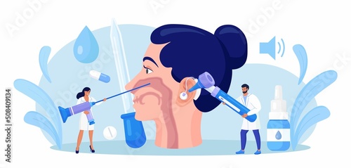 Otolaryngology concept. ENT doctor treating diseases of ear, nose, throat and neck. Otolaryngologist with medical instrument examines patient. Otoscopy procedure. Nasopharynx, sinuses, ear specula.