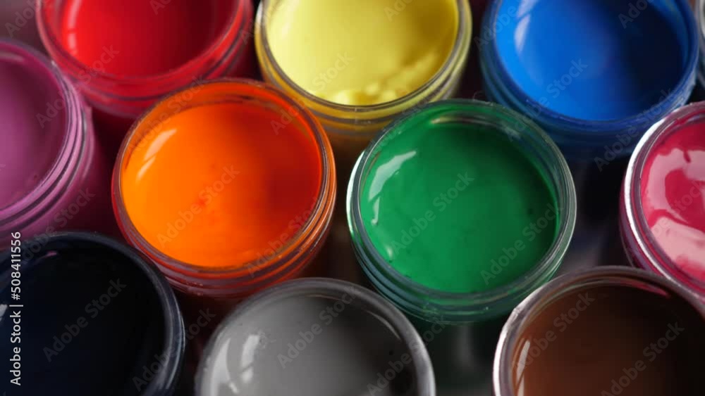 Set Gouache Paints in Jars Bright Color Close Up. Rotation Set of Multicolor Gouache on Plastic Jars. Rotation Multicolor Background. Background of Multi Colored Paint. Creative Drawing Art Hobby. Set Gouache Paints in Jars Bright Color Close Up. Rotation Set of Multicolor Gouache on Plastic Jars. Rotation Multicolor Background. Background of Multi Colored Paint. Creative Drawing Art Hobby.