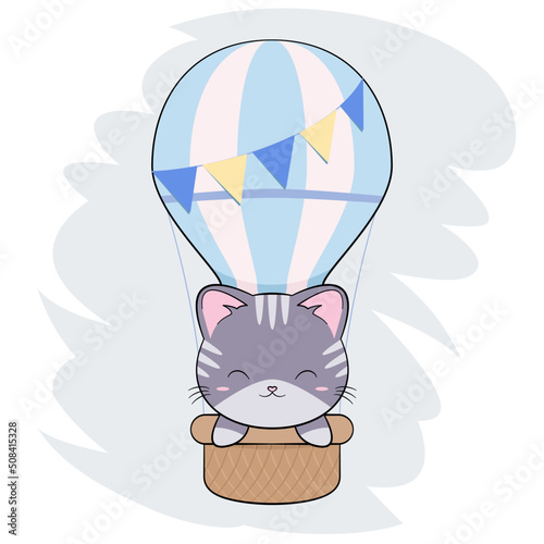 Mały uroczy kotek w niebieskim balonie. Ręcznie rysowana ilustracja. Słodki zabawny zwierzak.