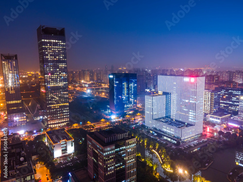 Aerial photography night view of modern buildings in Suzhou city, China