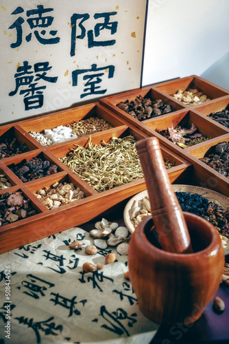 Obraz na plátně Chinese herbal medicine and flower tea on wooden