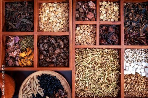 Chinese herbal medicine and flower tea on wooden © 昊 周