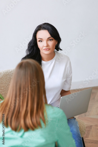 female psychologist consulting woman. Business, support, education concept