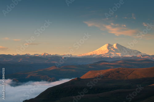 Elbrus mount at sunrise from Gil-Su valley in North Caucasus  Russia. Beautiful autumn landscape