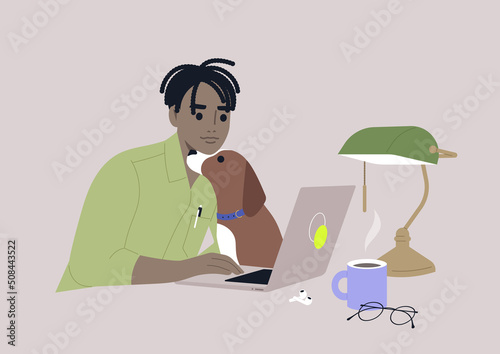 A young male African character cuddling with their dog while working on a laptop, a work from home concept
