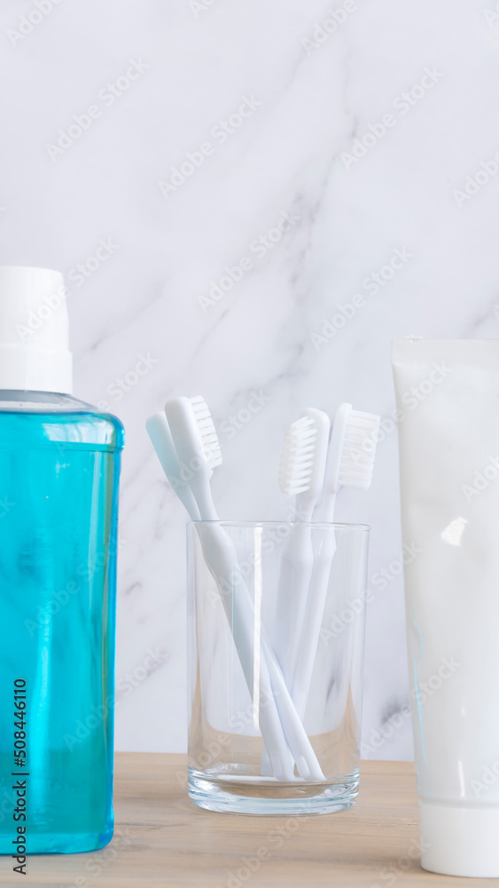 Mouthwash, toothpaste and toothbrushes. Image with selective focus Mouthwash, toothpaste and toothbrushes. Image with selective focus