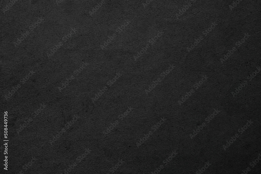 black background, paper texture similar to concrete wall