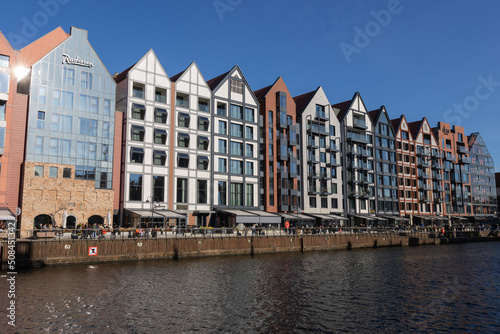 Gdansk, Poland - May 25 2022 "Architecture and water trams on old Motlawa river in Gdansk"