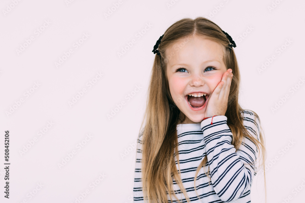 Portrait of little surprised girl excited scared on white background Portrait of little surprised girl excited scared on white background