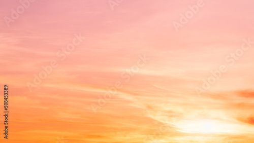Fotografie, Obraz Evening sky with romantic colorful sunlight with bright orange, yellow and pink sunset dramatic nature pastel background
