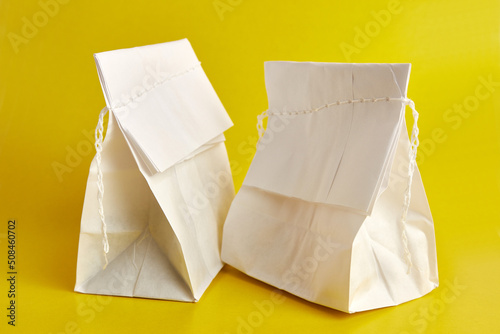 Foto Paper bag with coffee beans, sewn with thread