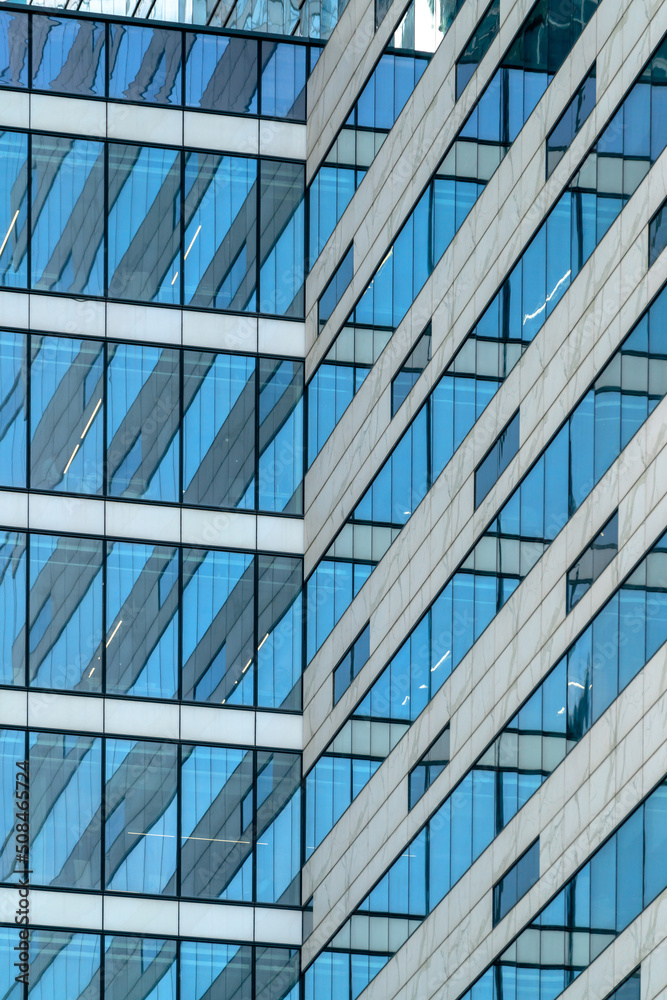 Obraz premium Glass facade of a modern building. Construction and rental housing.