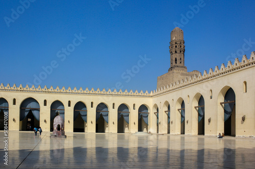 Minaret of public historic Al Hakim Mosque known as The Enlightened Mosque, located in Moez Street