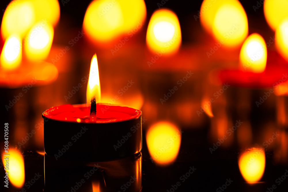 Candle,Many candles burn with a shallow depth of field 
