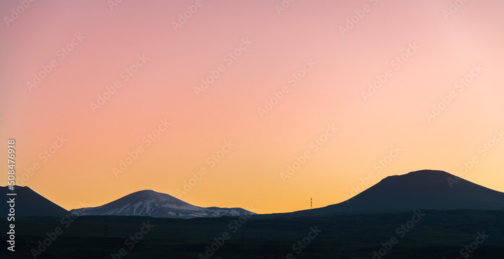 Beautiful orange sunset over mountains