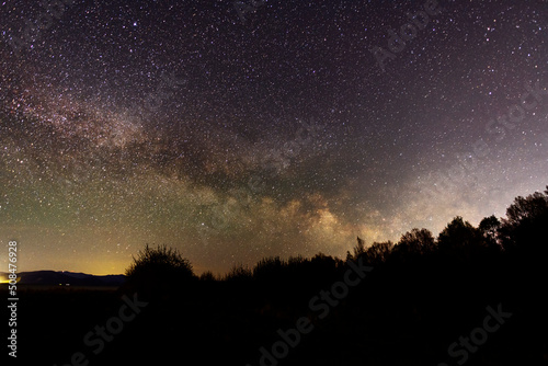 Beautiful bright milky way galaxy at the night sky. Astronomical background.