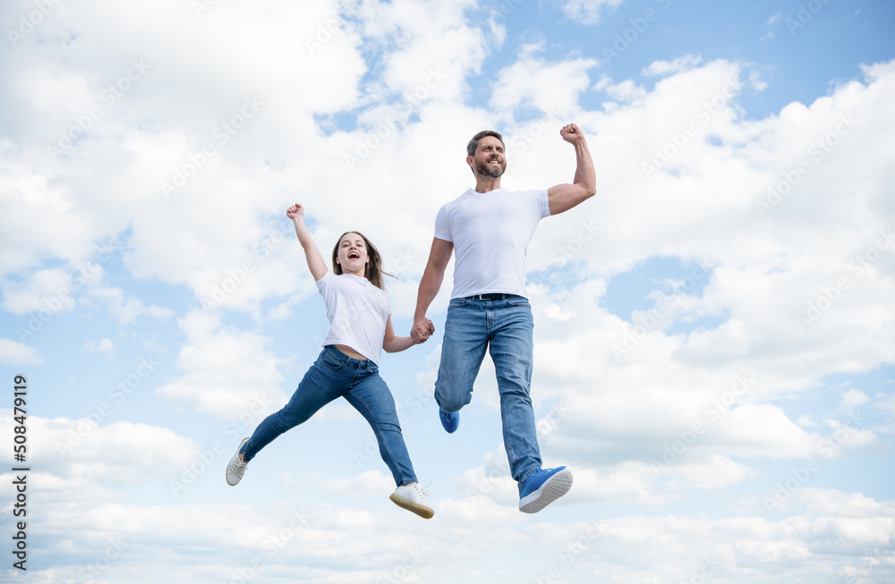 happy father and daughter jump in sky. happiness happy father and daughter jump in sky. happiness