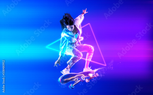 Skateboarder doing trick on neon background