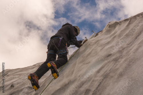 Принти на полотні Mountaineer climber practicing ice climbing in a crevasse on Mount Baker in Nort