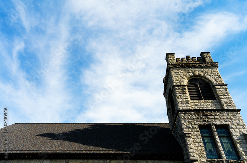 A contrasty image of a church on a cloudy day