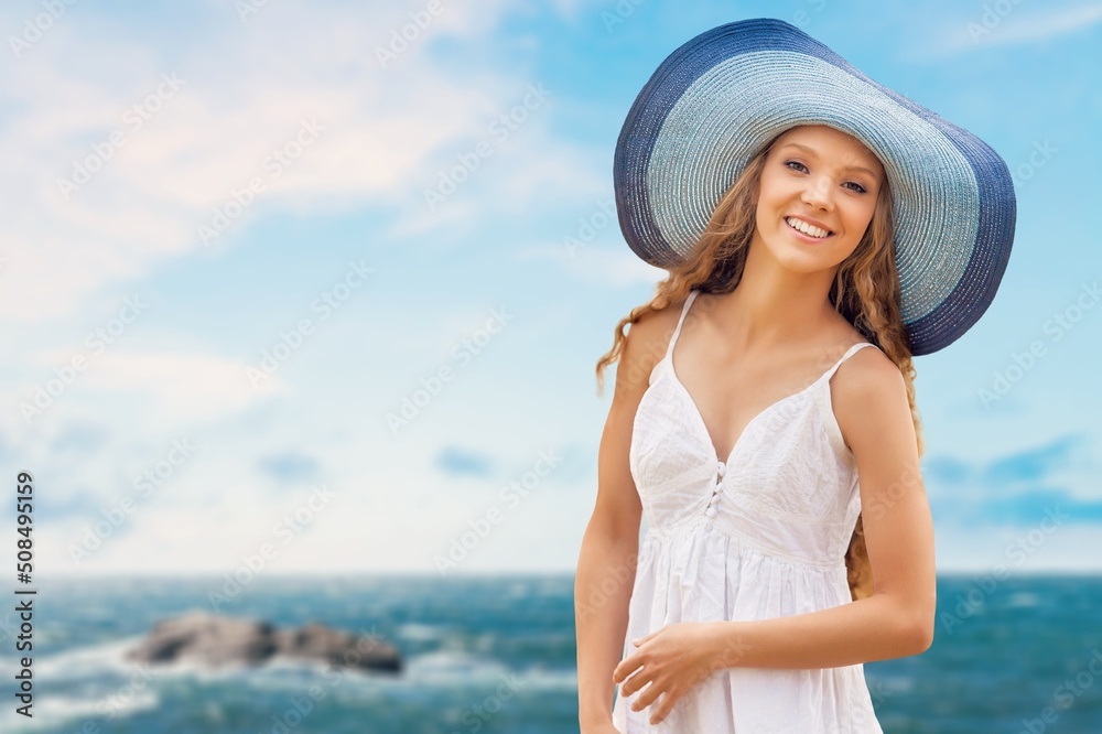 Woman in Sun Hat on beach sea background