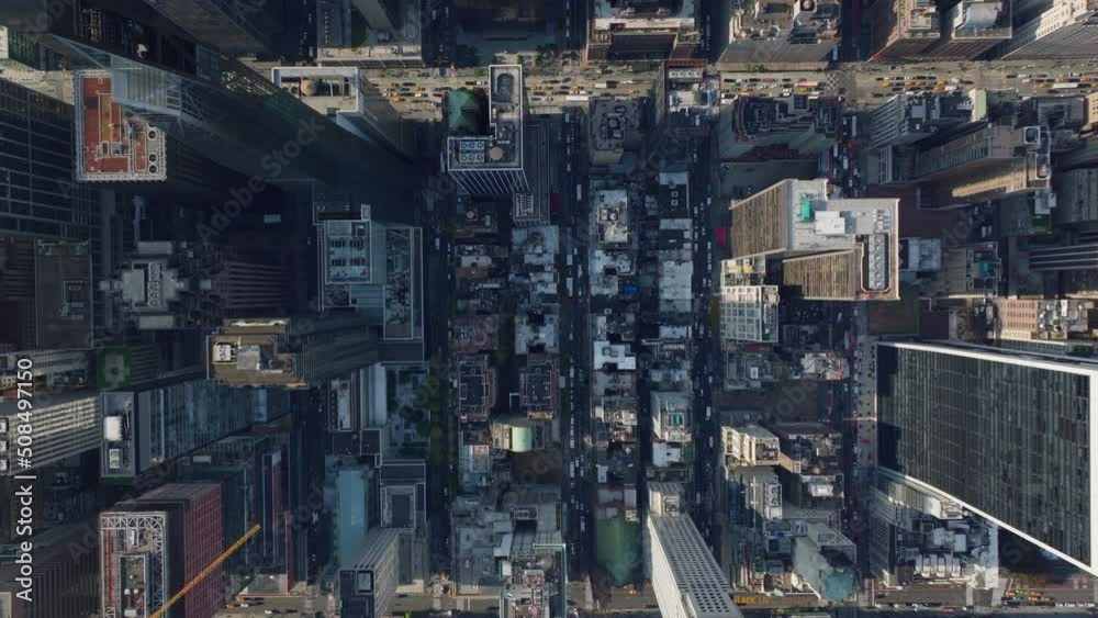 Aerial birds eye overhead top down view of traffic jam on avenue and surrounding streets in city centre. Manhattan, New York City, USA Aerial birds eye overhead top down view of traffic jam on avenue and surrounding streets in city centre. Manhattan, New York City, USA