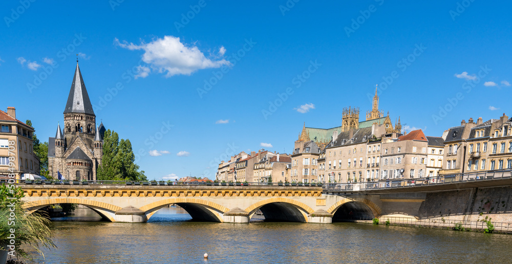 the Moselle River and Moyen Bridge with the historic city center of Metz behind