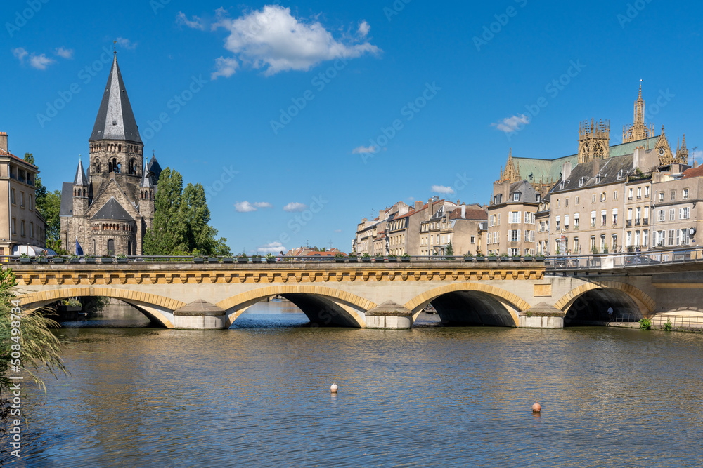 the Moselle River and Moyen Bridge with the historic city center of Metz behind