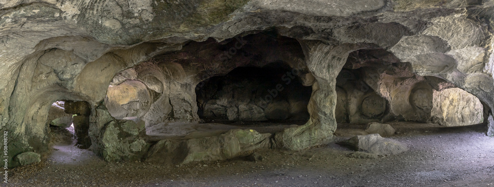 panorama view of the historic Hohllay Roman cave used for making millstones in the Mullerthal region of Luxembourg panorama view of the historic Hohllay Roman cave used for making millstones in the Mullerthal region of Luxembourg