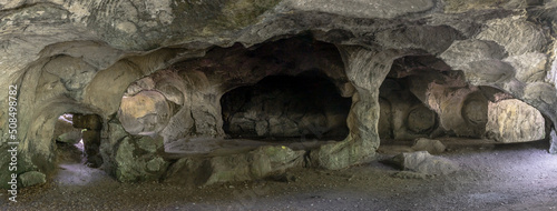 panorama view of the historic Hohllay Roman cave used for making millstones in the Mullerthal region of Luxembourg photo