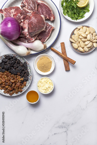 Raw ingredients and spices of traditional lamb stew or tagine