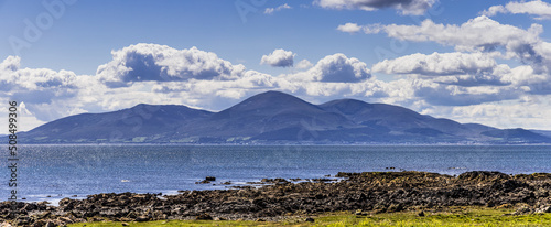 Mourne mountains silhouette pano from Saint Johns Point, Lecale Way, County Down, Northern Ireland photo