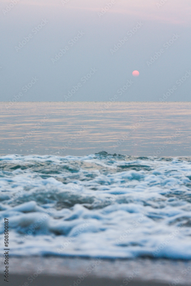 Bubbles on golden beach with ocean water in the morning at Thailand beaches. Bubbles on golden beach with ocean water in the morning at Thailand beaches.