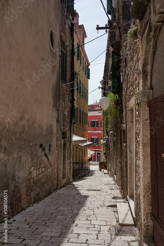 Sibenik  Croatia - May 26  2022 - narrow old street and yard in Sibenik city  medieval zone