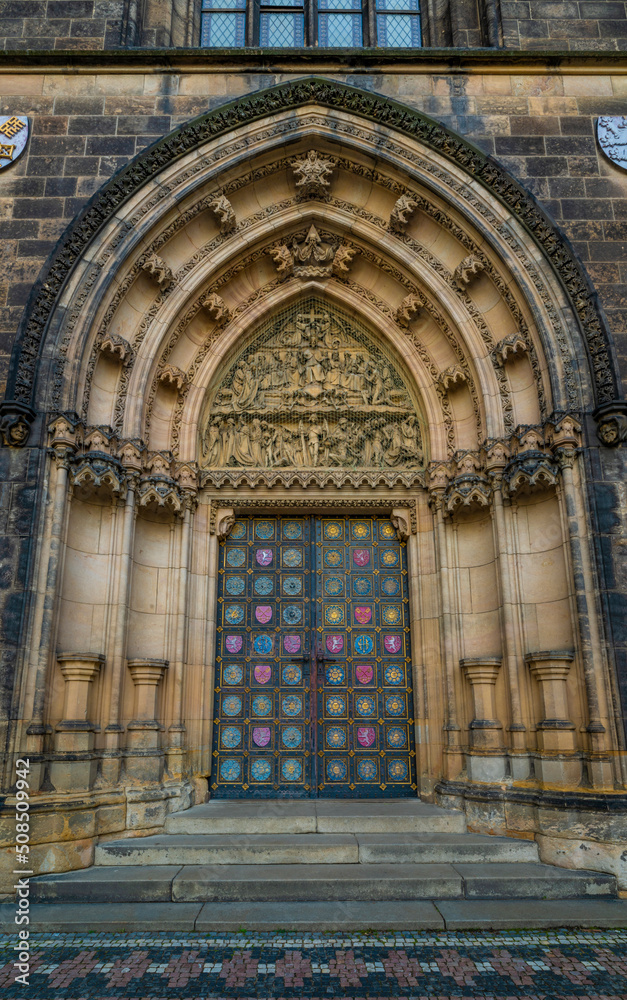 Doors in church in Prague with sunrise time and colors