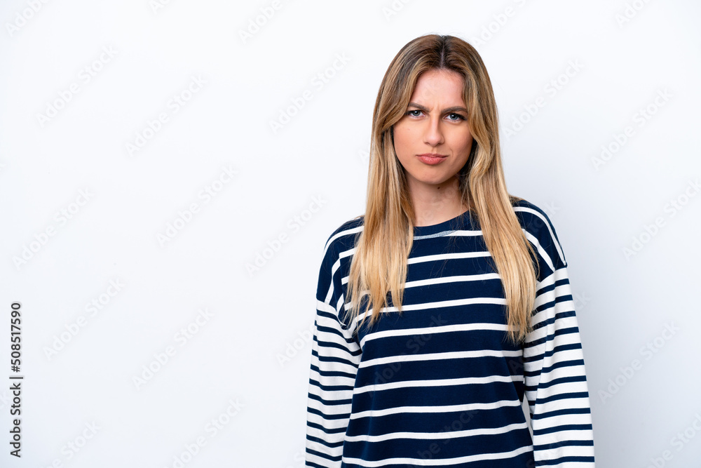 Young Uruguayan woman isolated on white background with sad expression Young Uruguayan woman isolated on white background with sad expression