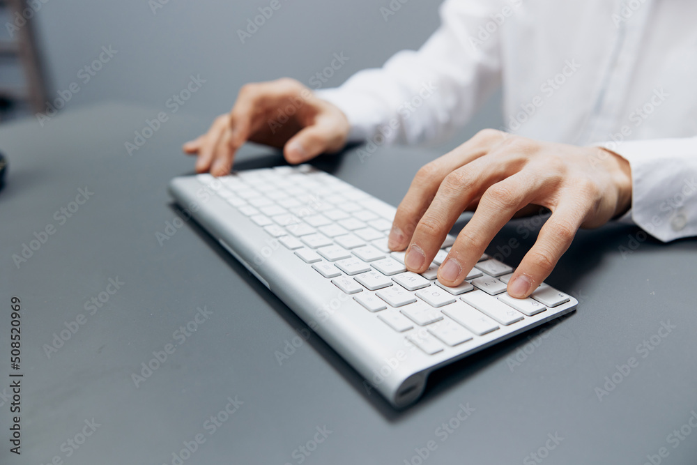 manager in a white shirt keyboard work official office Lifestyle work manager in a white shirt keyboard work official office Lifestyle work