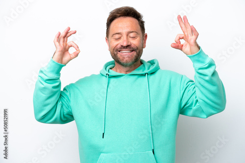 Middle age caucasian man isolated on white background in zen pose © luismolinero