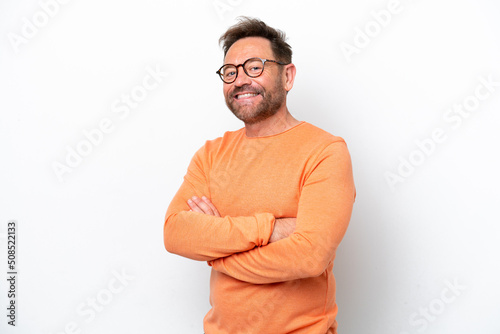 Middle age caucasian man isolated on white background with arms crossed and looking forward