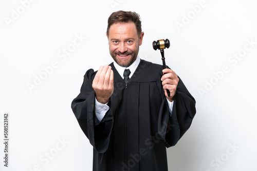 Middle age judge man isolated on white background inviting to come with hand. Happy that you came