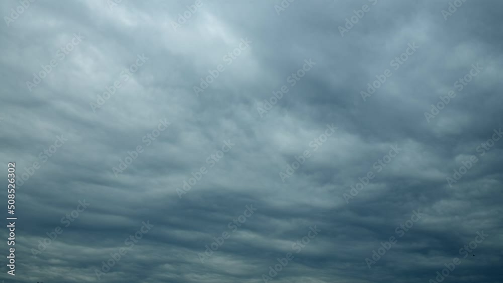 Time lapse of moving gray clouds on sky Time lapse of moving gray clouds on sky