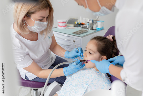 Child to the dentist. Child in the dental chair