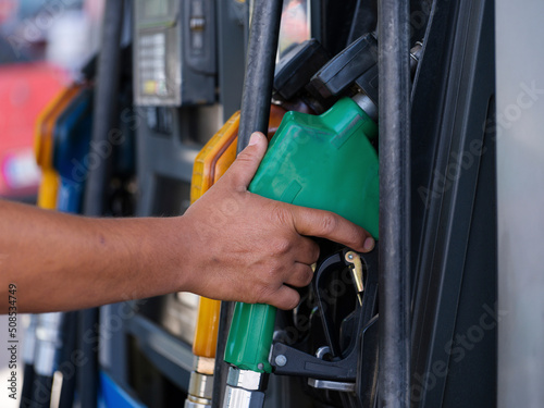 Petrol pump filling nozzles, Gas station in a service